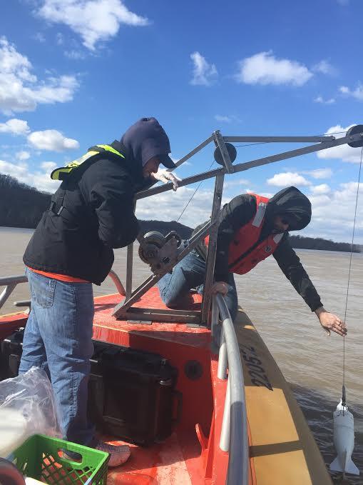 Sampling off of a boat in the Susquehanna River