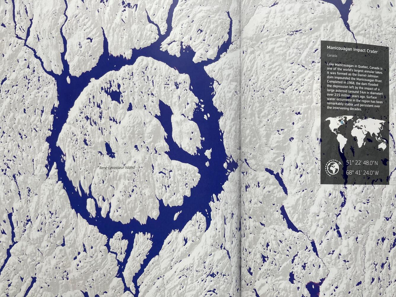 Color photo of "Atlas of Global Surface Water Dynamics" book pages