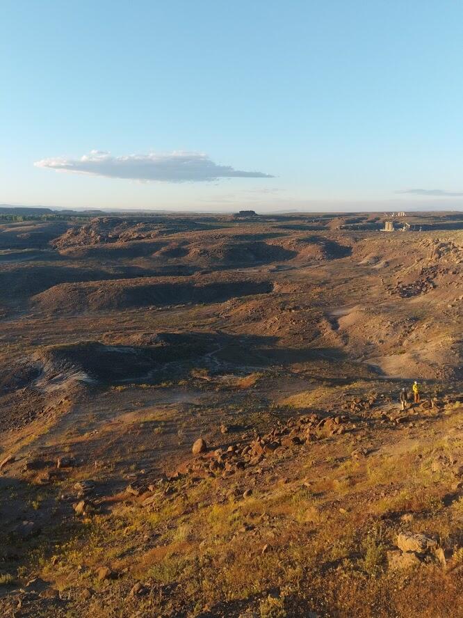 Walking back to camp, fossilbeds under foot and pumpjacks thumping in the background