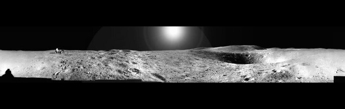 Apollo 16 panorama collected by Charles Moss Duke at Station 2. John Watts Young is at the rover. Spook Crater in the foreground