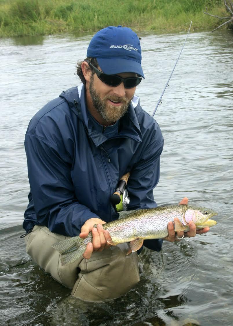 Photo of D. O'Leary holding a rainbow trout on the Alagnak River