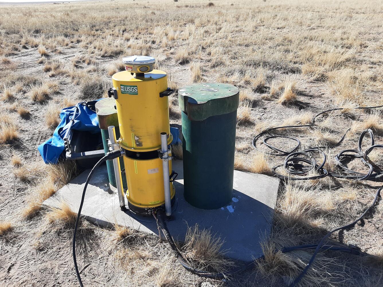 Photograph showing an absolute-gravity meter at a monitoring well near Albuquerque, NM