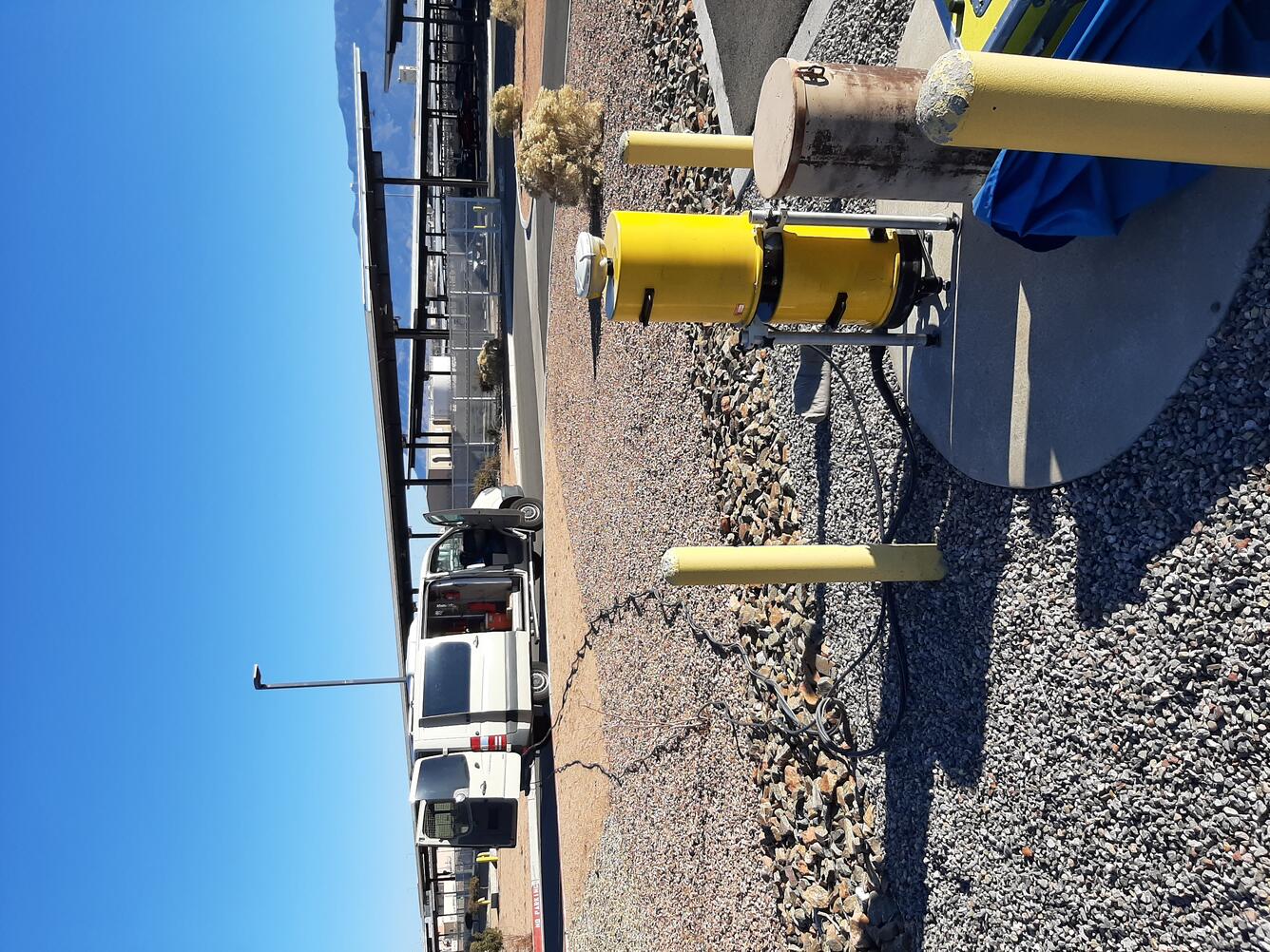 Photograph showing an absolute-gravity meter at a monitoring well in Albuquerque, NM