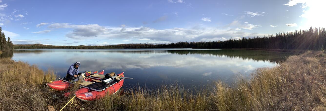 Scientist prepares to go sample Alaskan lake