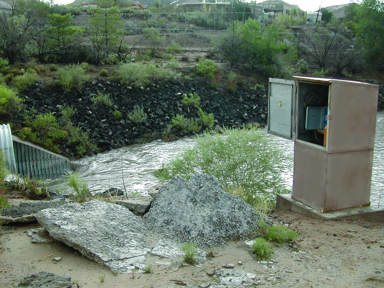 July 2006 stormwater flow; view oriented upstream at streamgage 083299375, Mariposa Diversion of San Antonio Arroyo site.