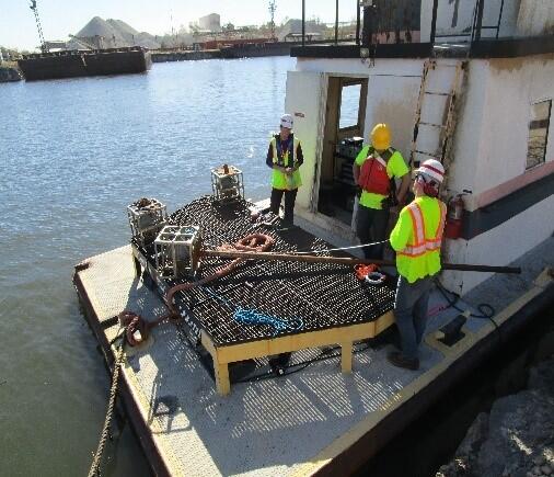 Staff deploying an acoustic deterrent system in the CAWS