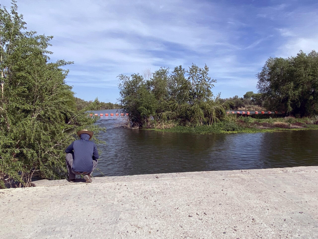 Photo of USGS scientists establishing a sampling cross-section.