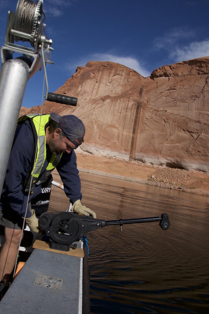 Wayne Baldwin, USGS, deploys a sound velocity profiler off the R/V Stephens in Lake Powell, UT-AZ.