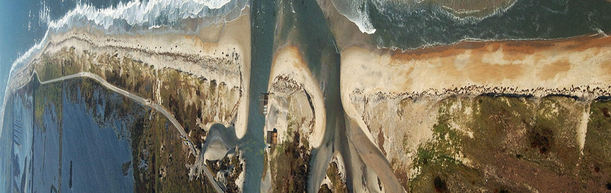  Beach erosion at Rodanthe, NC, along the coast on August 30, 2011, three days after landfall of Hurricane Irene