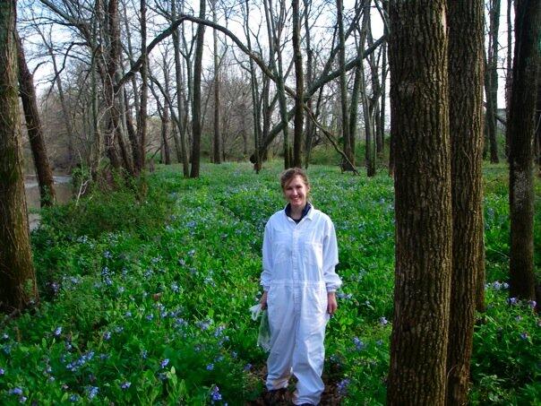 Kristen Hoefke in a flood plain of Virginia bluebells.
