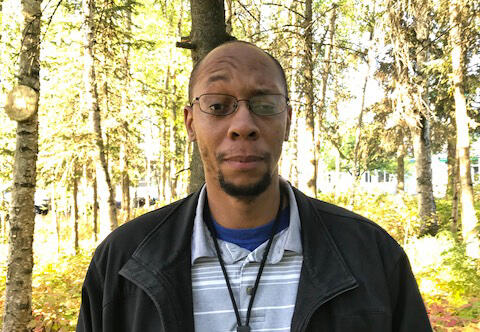 Man standing in trees