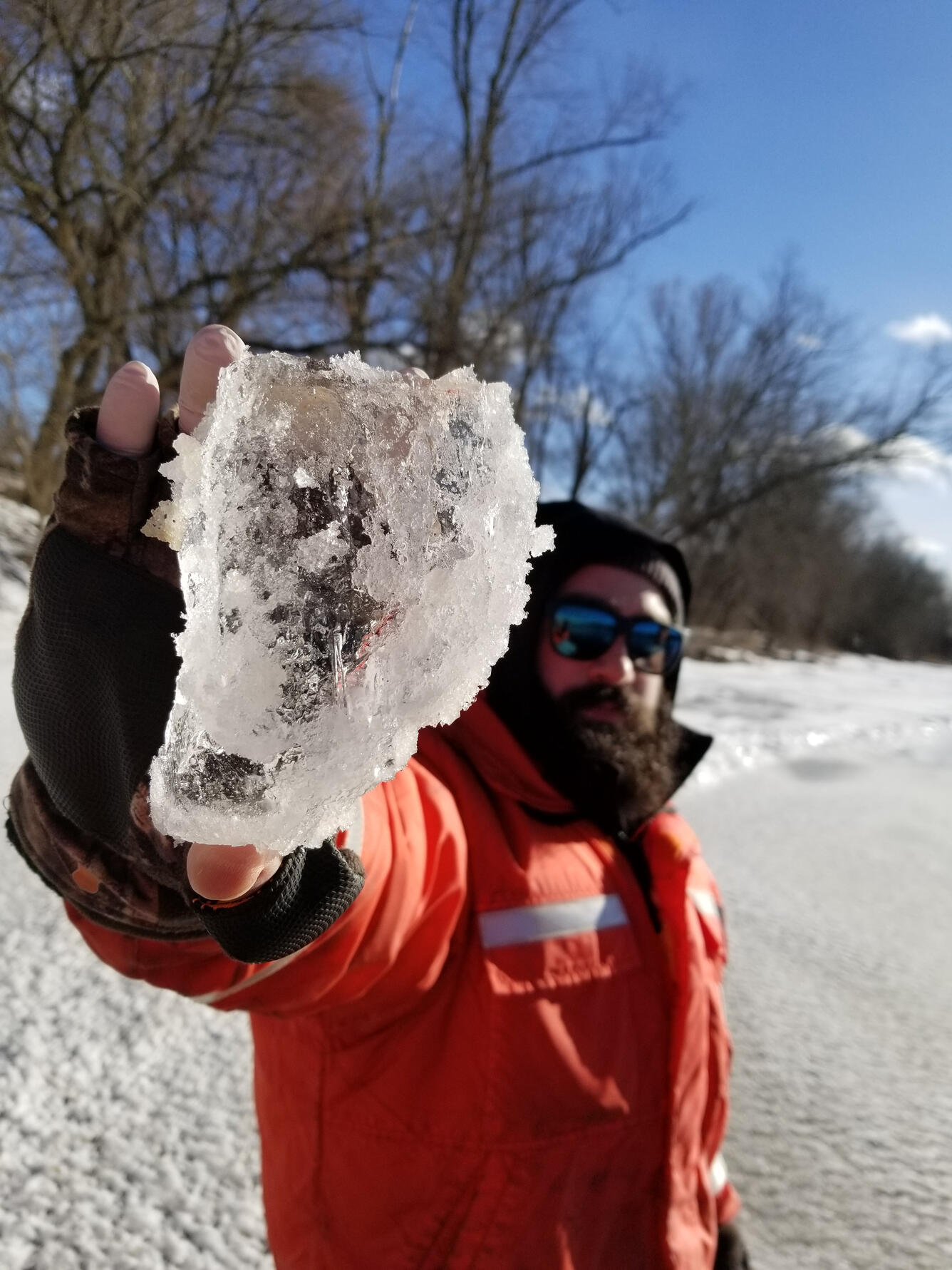 Jonathan Cohl holding a piece of ice from Delaware River at Frenchtown, NJ