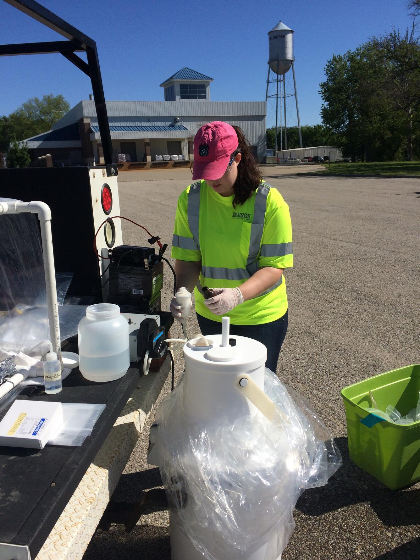 USGS employee field processing a sample at Neosho River