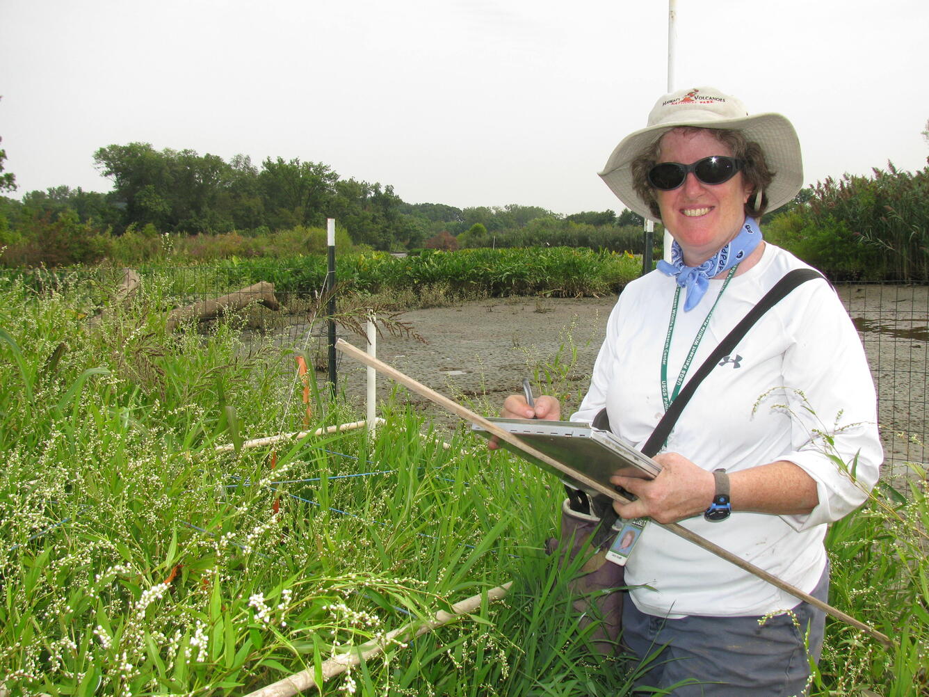 Cairn Krafft sampling vegetation in Anacostia Park