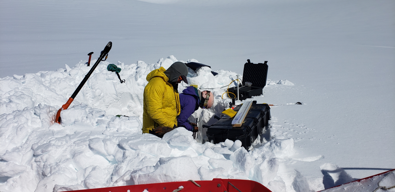 scientists collecting data on Gulkana Glacier