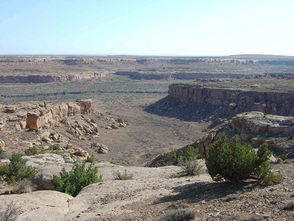 This is a photo of a view looking south toward the valley of Chaco Wash from the trail to Tsin Kletson on top of the North Mesa.