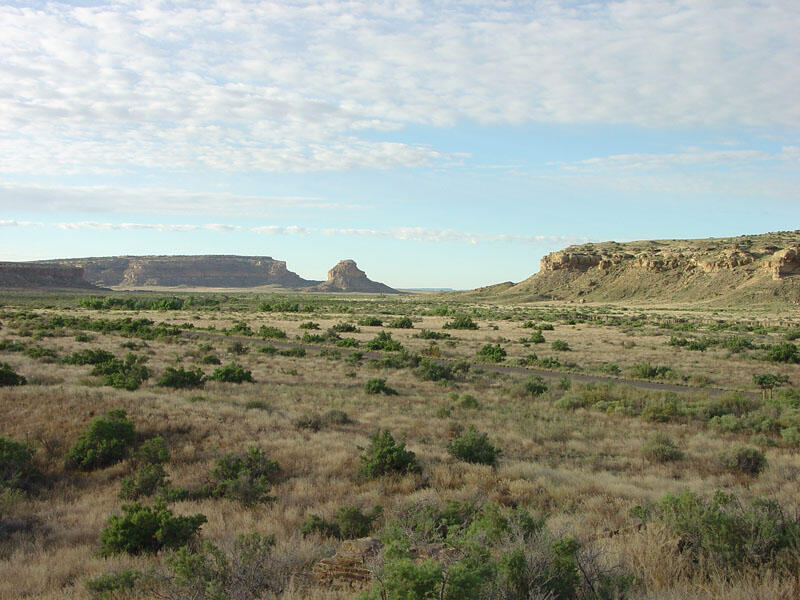 This is a photo of a view looking southeast along Chaco Canyon toward Fajada Butte.