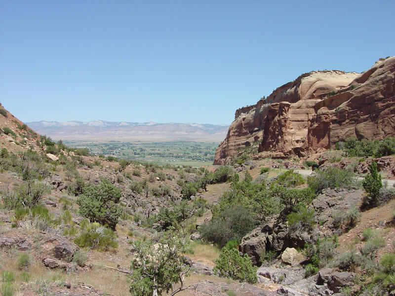 This is a photo of a view looking north down Fruita Canyon toward the Grand Valley.