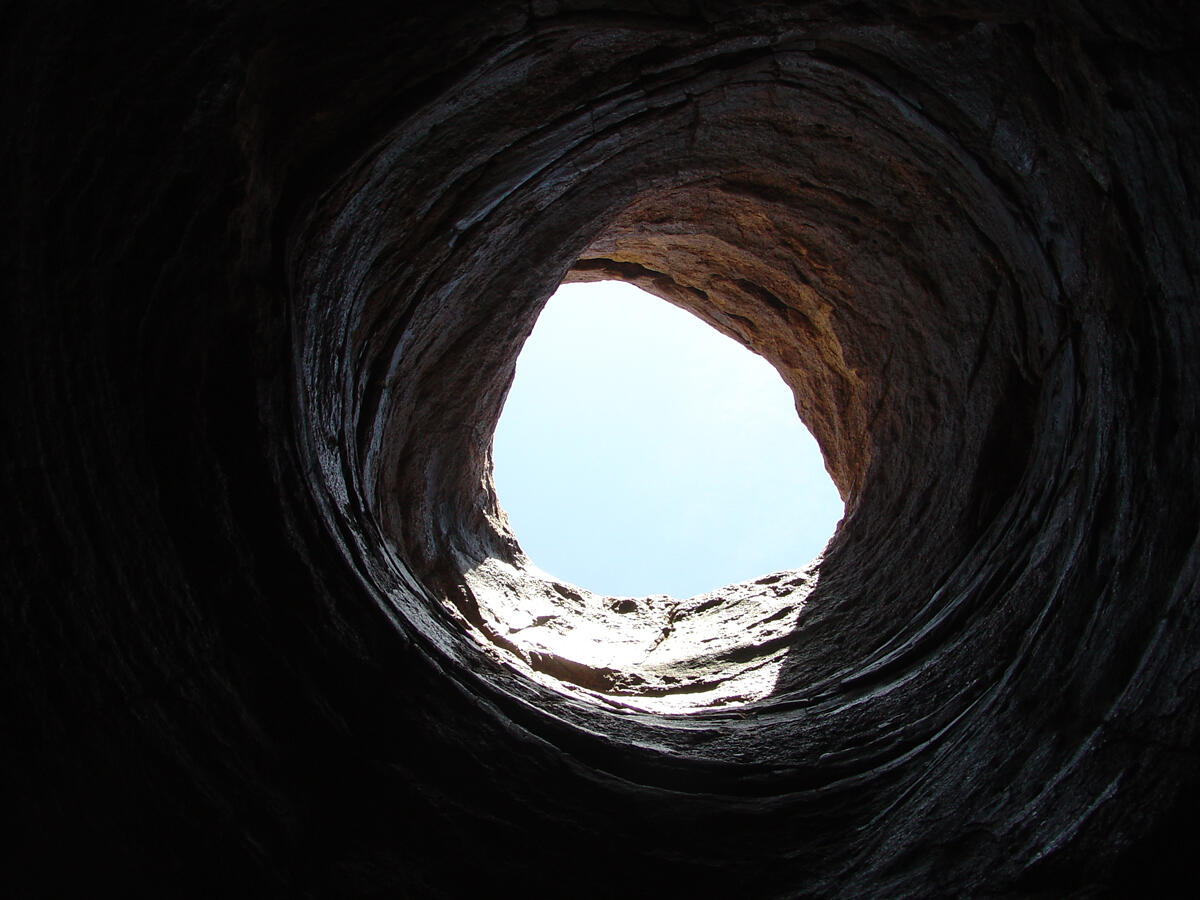 This is a photo of the entrance to a large pothole in the Tapeats Sandstone.