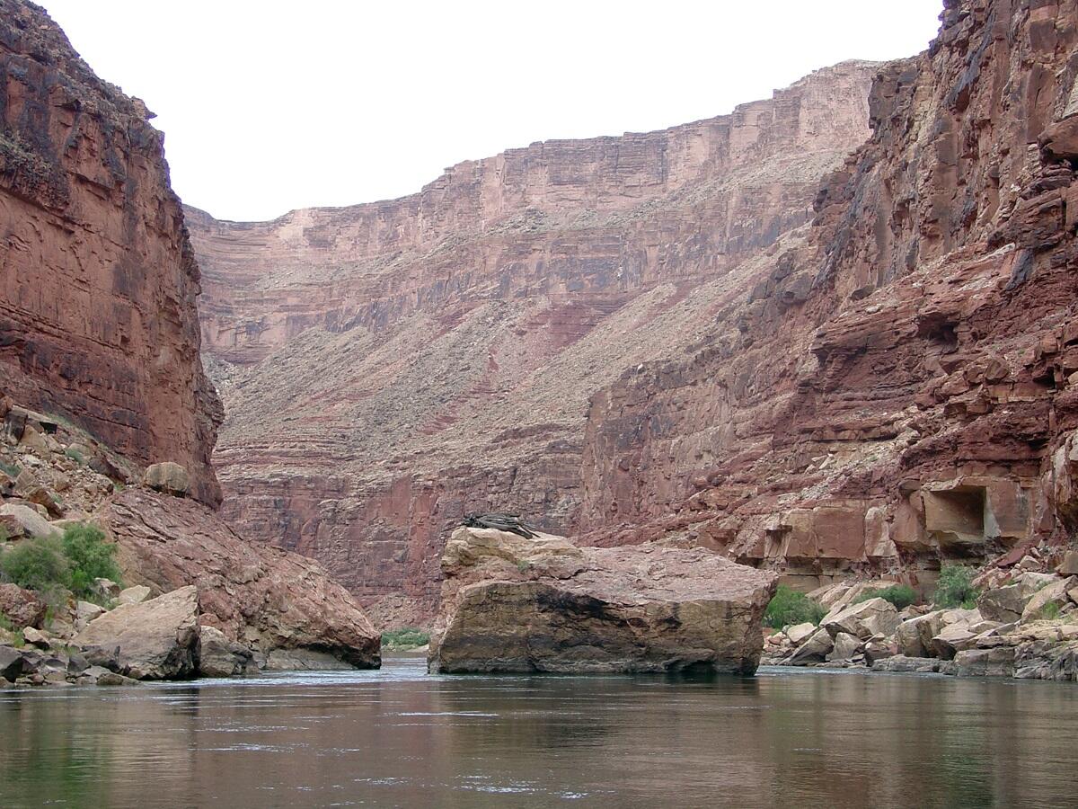 This is a photo of a great sandstone boulder in the Colorado River.