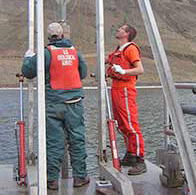 USGS scientists drilling core