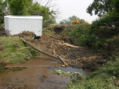 Trailer moved and damaged by flood water in SD