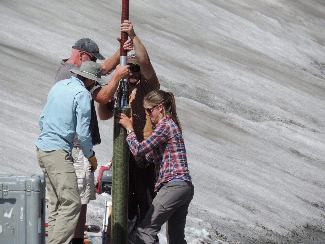 Researchers Pulling a Deep Ice Core Segment