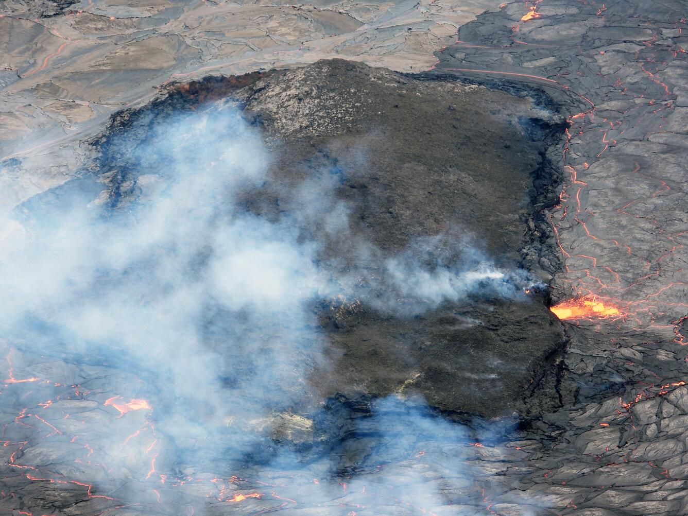 A telephoto image looking north at the largest island within the Halema‘uma‘u lava lake at Kīlauea summit