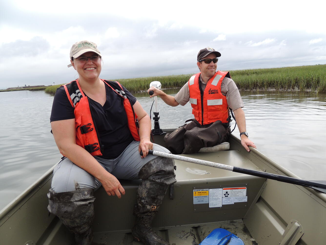 A photo of WERC scientist Karen Thorne and Seal Beach National Wildlife Refuge manager Kirk Gilligan.