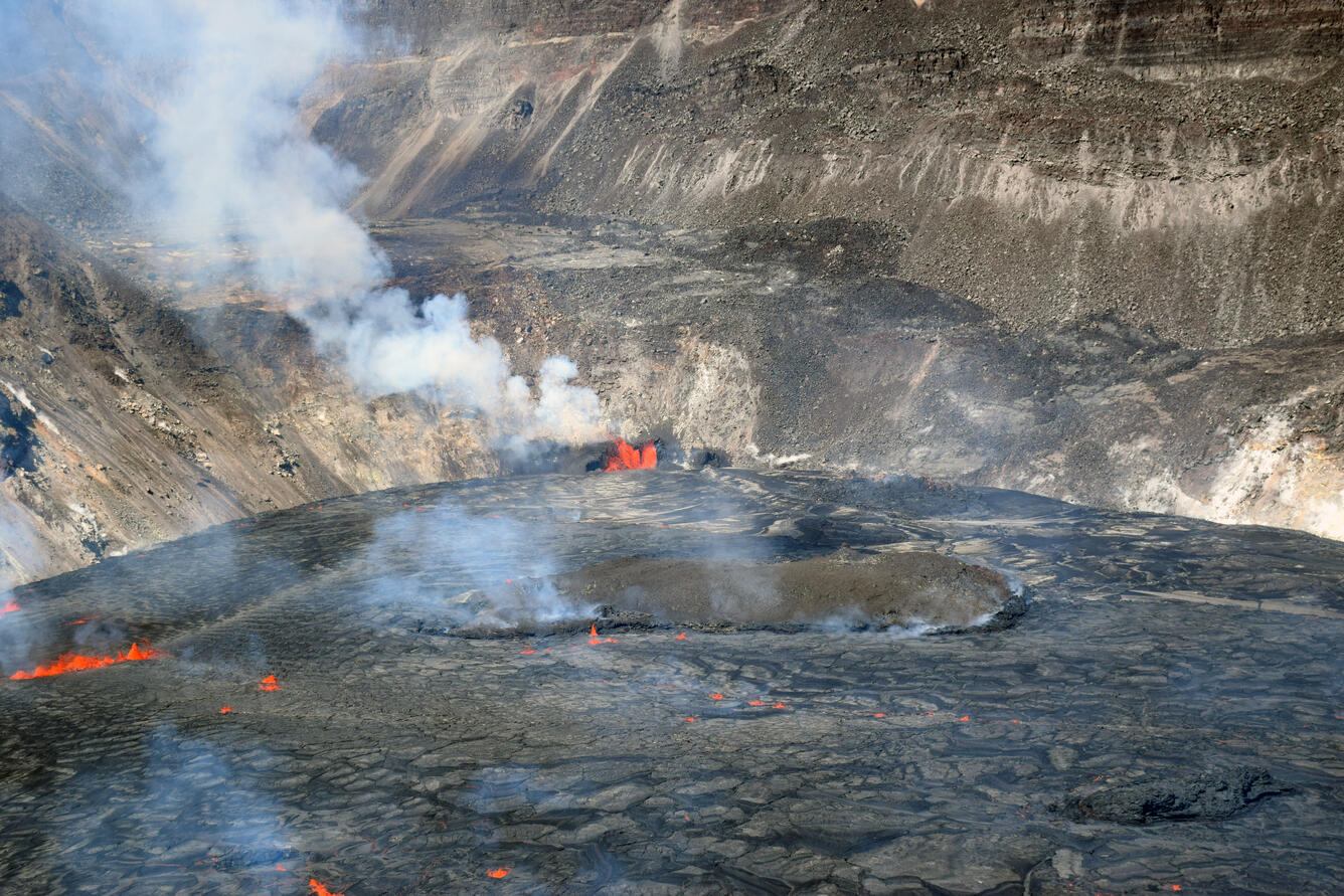 telephoto view of the south-central and western fissure fountains that continue to erupt lava into the growing lava lake