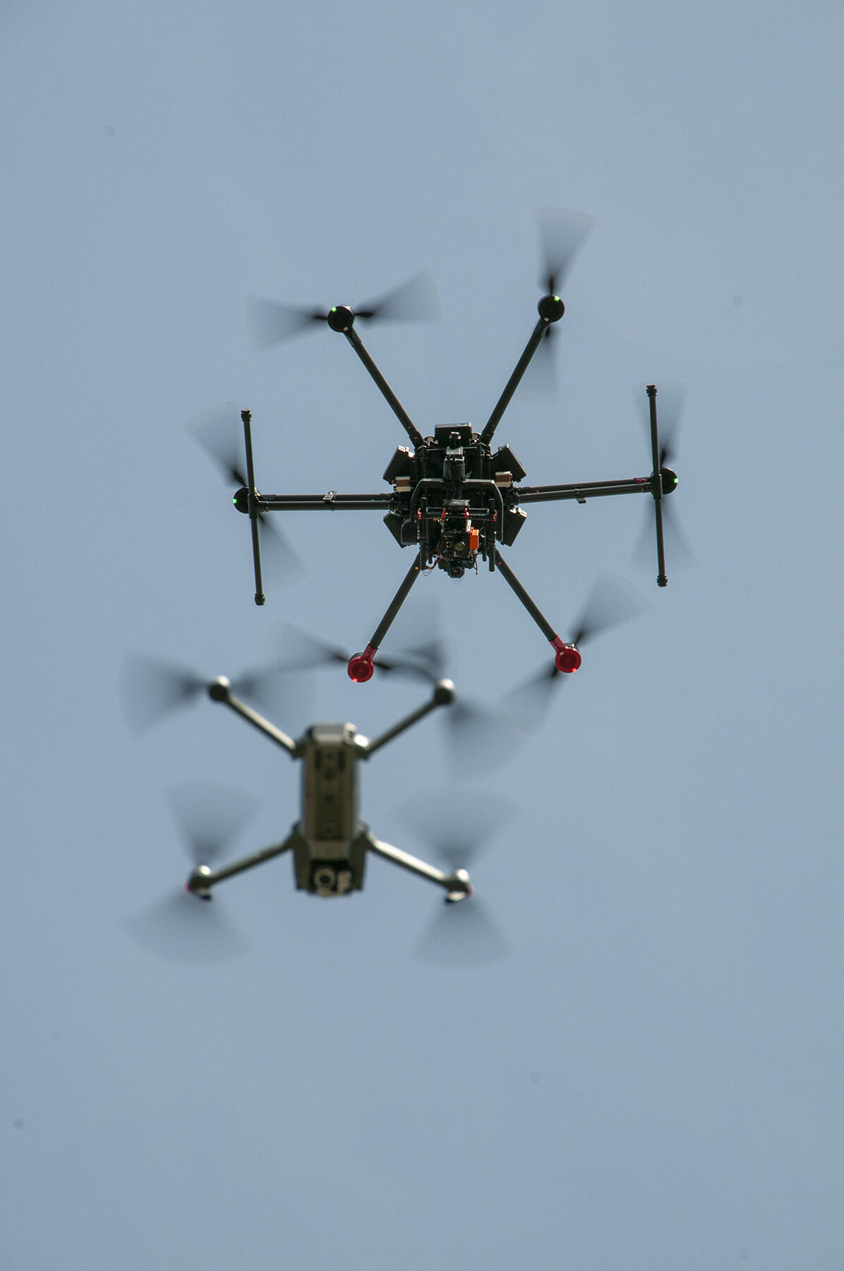 Two drones hover in observation