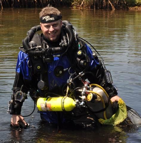 Damian Menning coming up from scuba diving