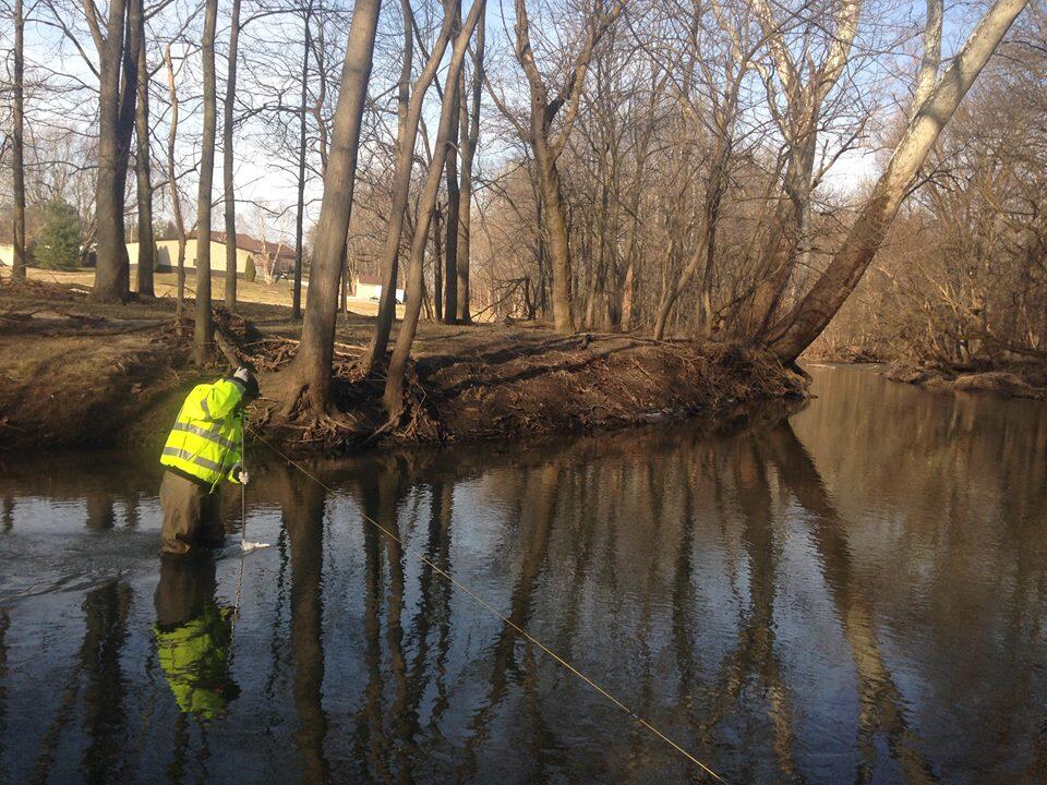 Dawn McClausland, sampling water quality at USGS station 03361650