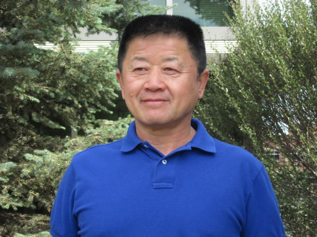 Quan Dong staff photo. 