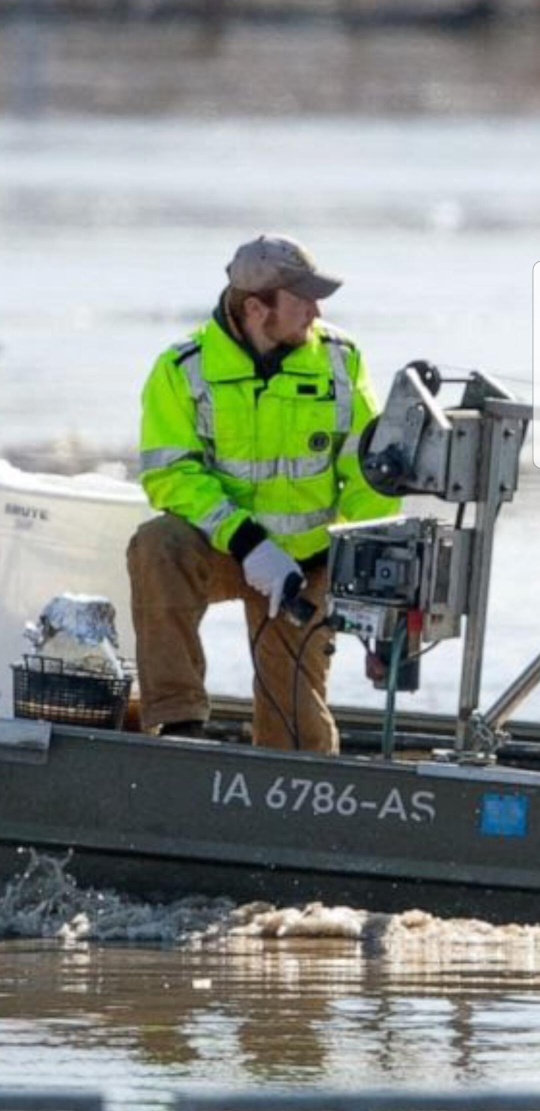Hydrologic Technician Collects Water Quality Samples at Omaha, NE