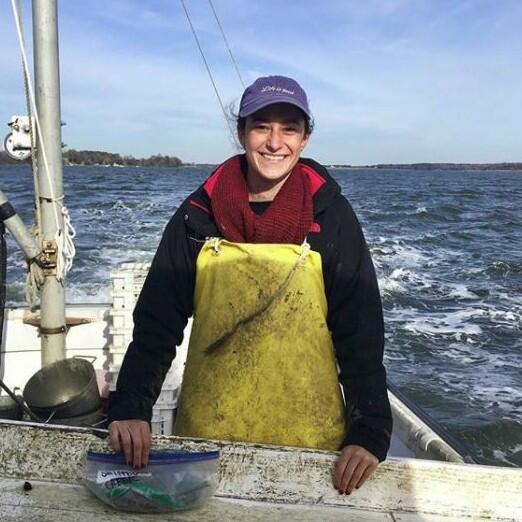 Photo of Hydrologic Technician, Ellen Woytowitz, during an oyster survey of the Chesapeake Bay.