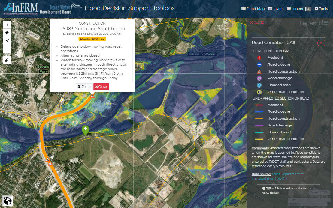 Screenshot of webmap - satellite view showing current road construction delays near an overpass with potential inundation levels