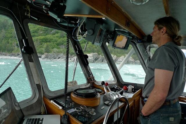 R/V Alaskan Gyre Captain Greg Snedgen in the wheelhouse