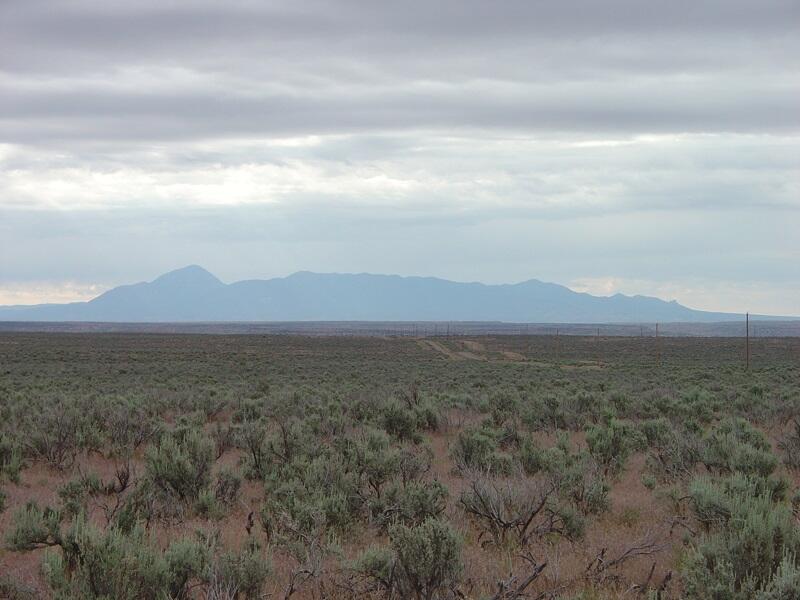 This is a photo of the broad, flat high sagebrush desert that caps Cajon Mesa.