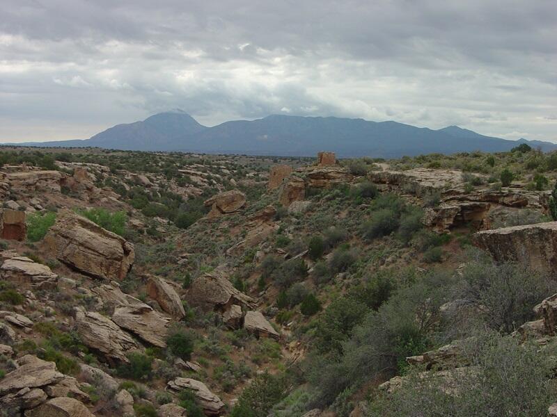 This is a photo of a view of Little Ruin Canyon toward Sleeping Ute Mountain in the distance.