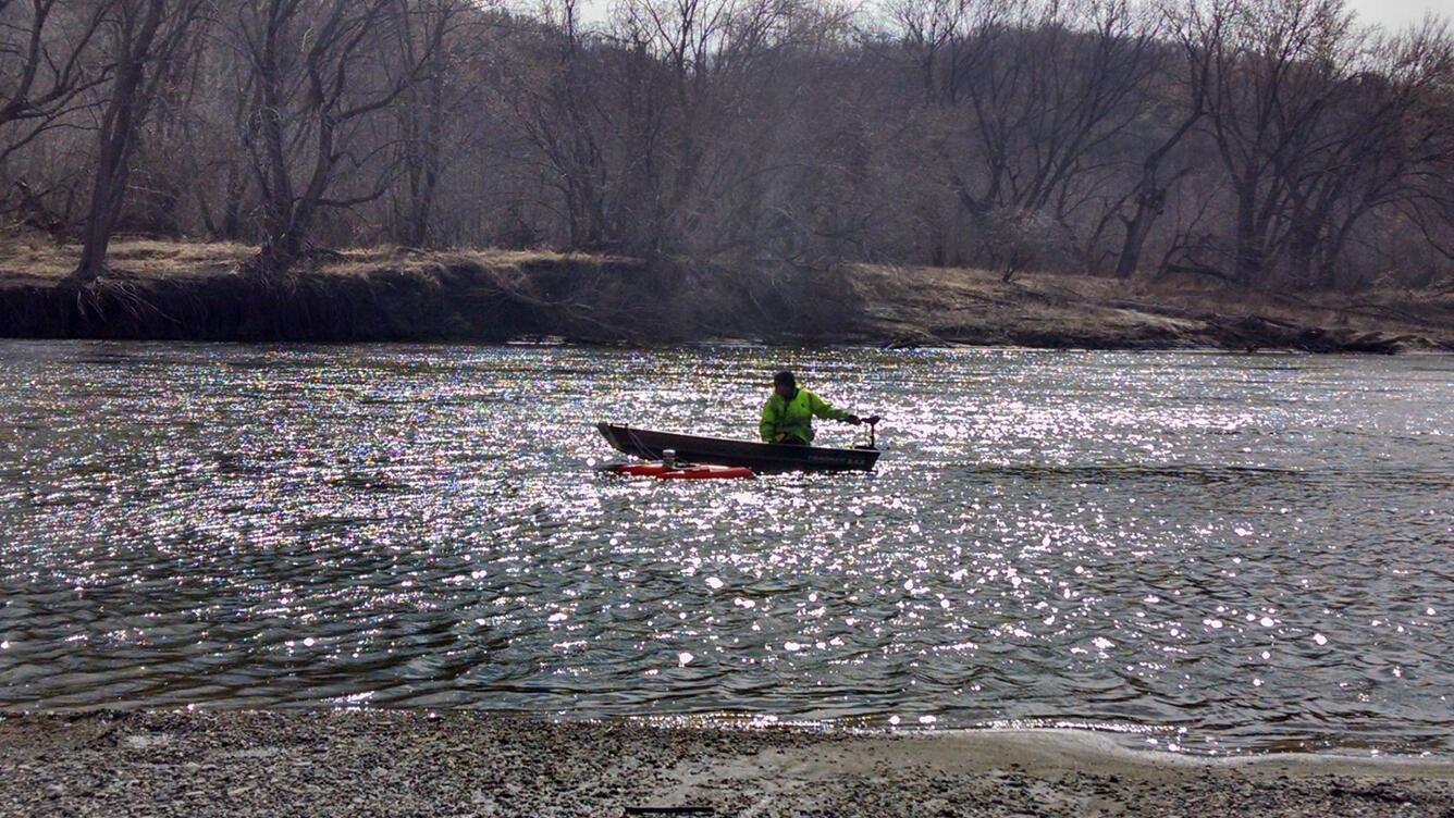 USGS Hydrologic Technician making streamgage measurement