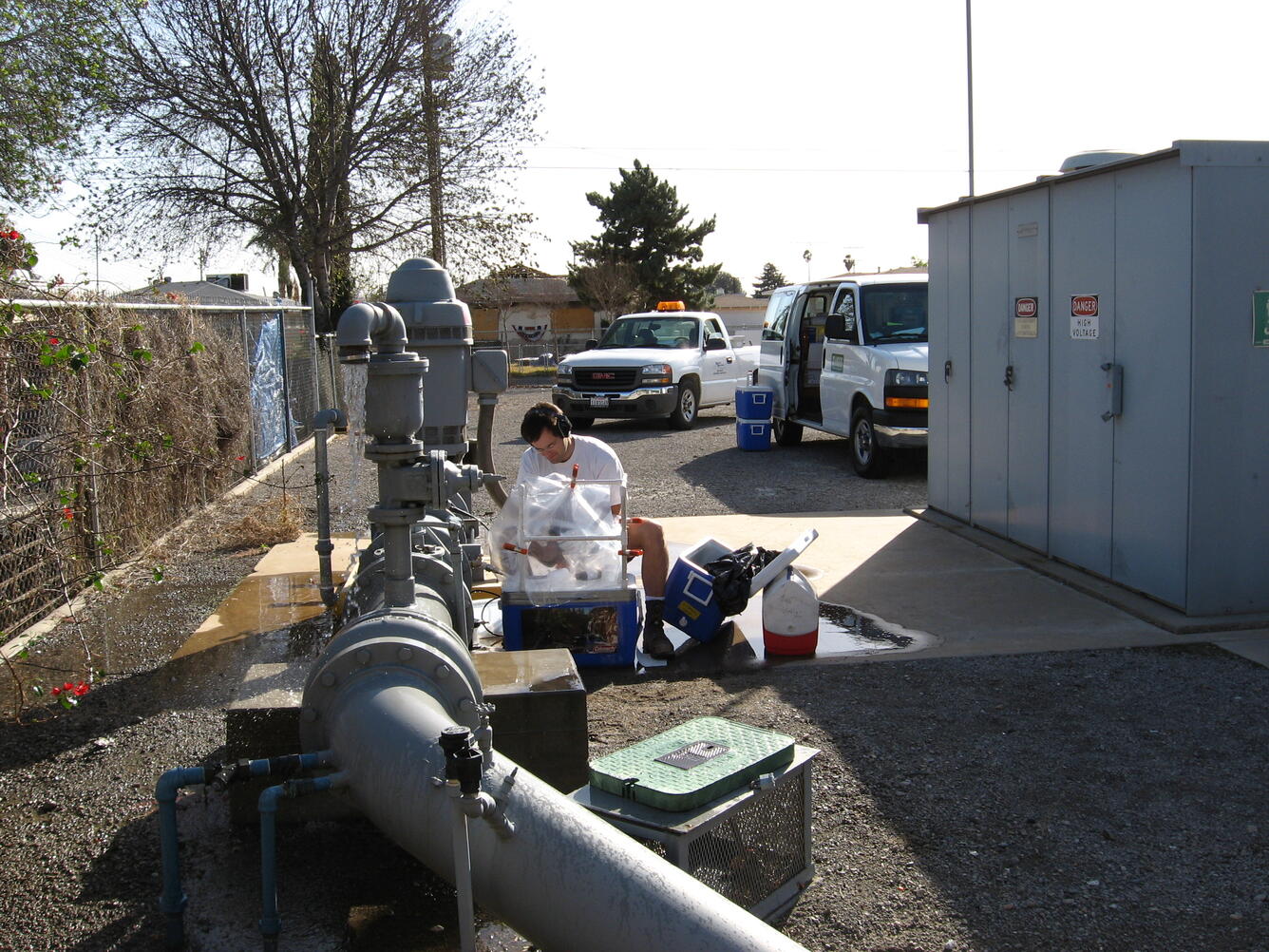 Hydrologist Michael Land is shown sampling a public supply well in the upper Santa Ana watershed.