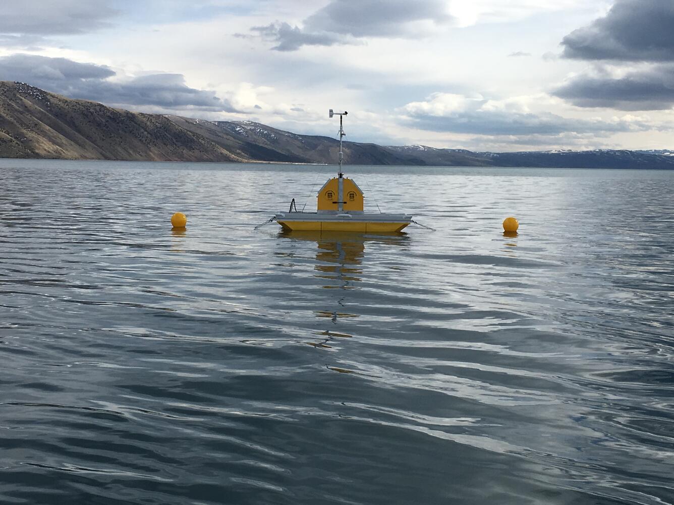 Bear Lake water-quality platform on the water as a storm moves in.