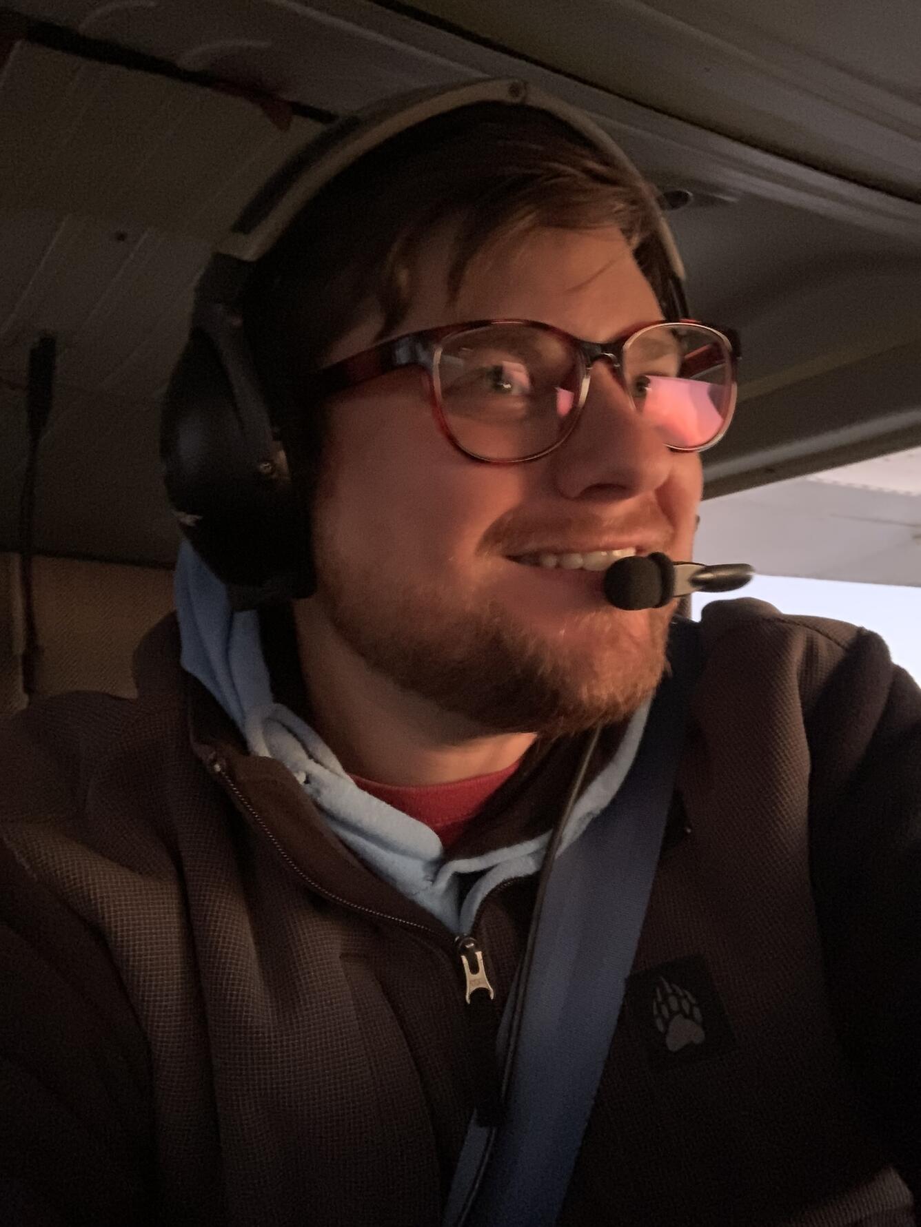 Photo of geographer, Benjamin Finley aboard N701