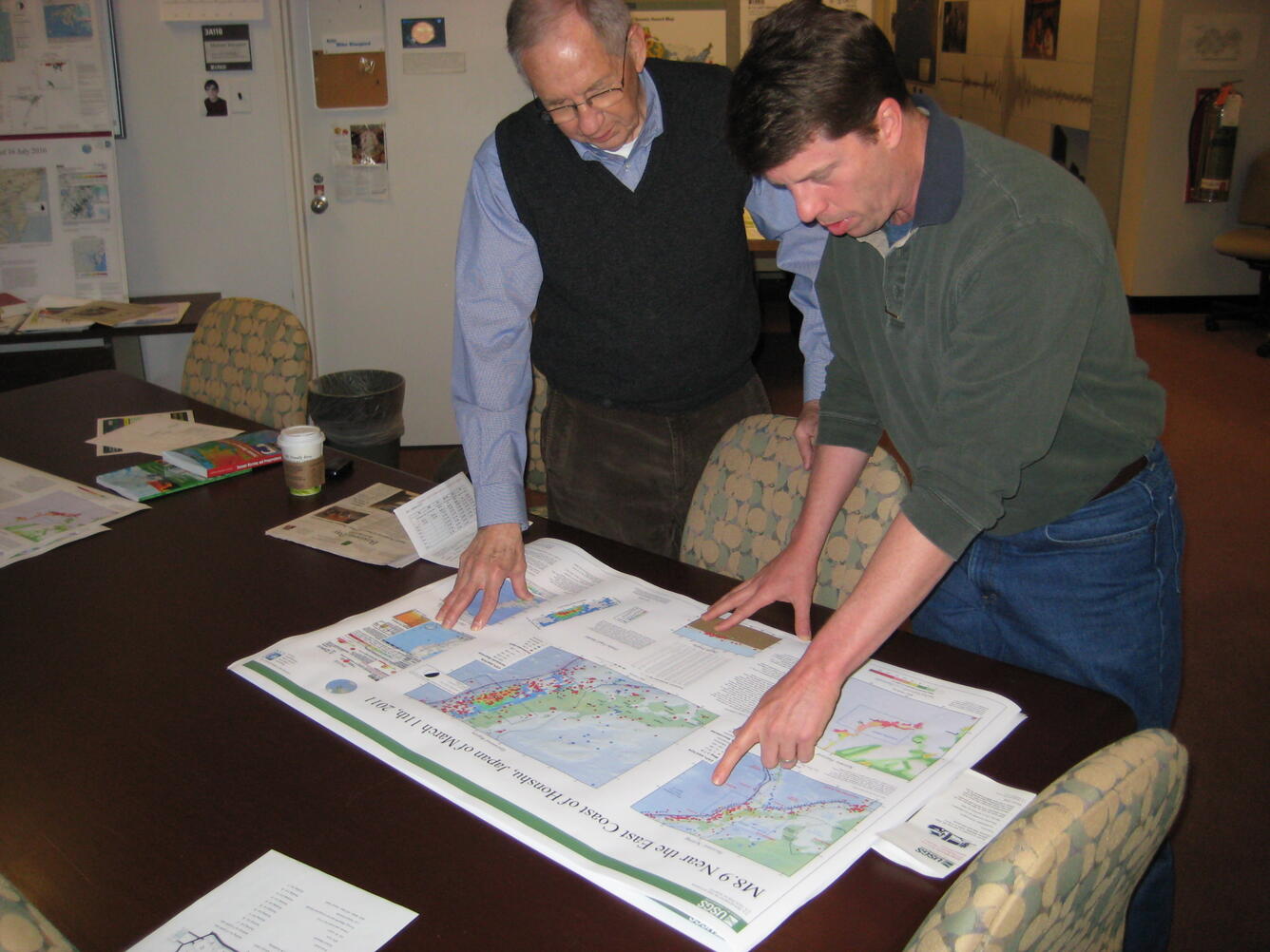USGS staff reviewing  a map