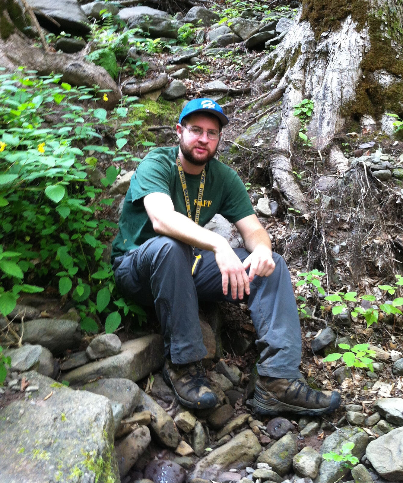 Photo of Donald Bonville, next to a stream in the Catskill Mountains