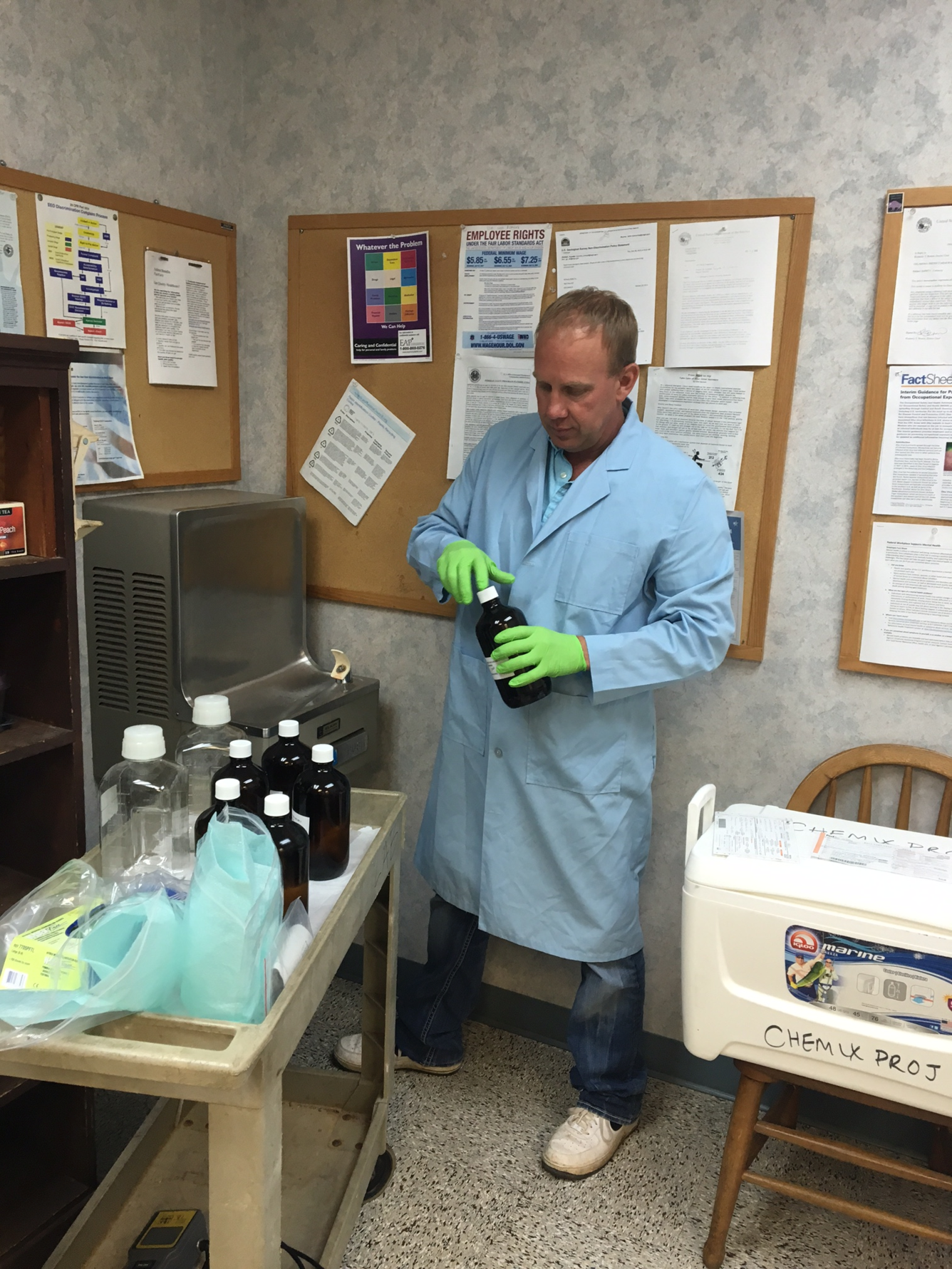 USGS scientist sampling tap water from a public water supply