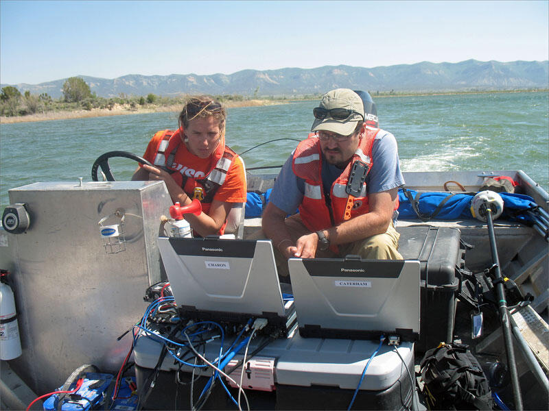 USGS employees monitor multibeam echo sounder data