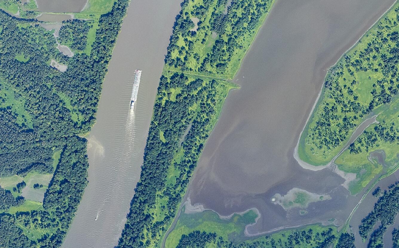 Aerial image of towboat and barges on the Illinois River near Beardstown, Illinois