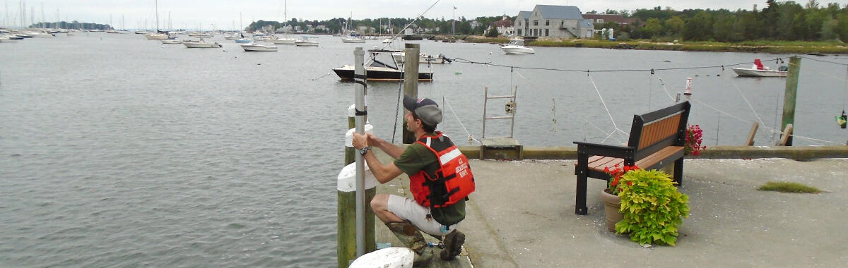 A USGS specialist installs a storm-tide sensor in Massachusetts before Hurricane Jose's arrival.